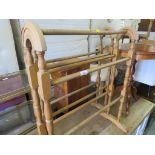 TWO LIGHTWOOD TOWEL RAILS.