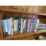 SELECTION OF DVDS AND BOOKS (ONE SHELF)