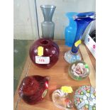 EIGHT PIECES OF STUDIO GLASS INCLUDING PAPERWEIGHTS , CANDLE HOLDERS AND VASES.