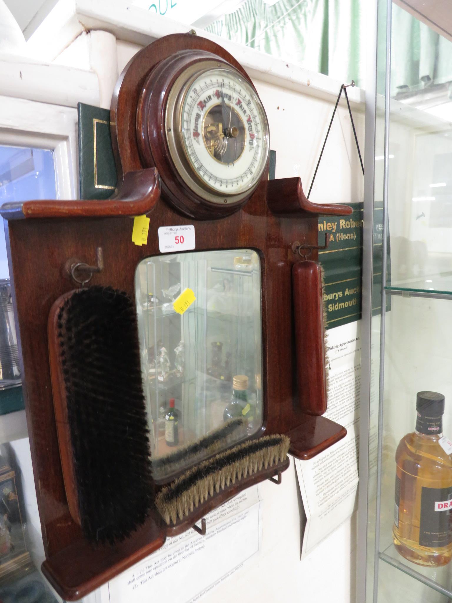 VINTAGE OAK MOUNTED HALLWAY BAROMETER WITH MIRROR AND HANGING CLOTHES BRUSHES.