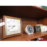 ASSORTED MANTEL CLOCKS AND A TRAVEL CLOCK.