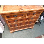 REPRODUCTION MAHOGANY AND WALNUT VENEERED CHEST OF TWO SHORT OVER THREE LONG DRAWERS. (AF)