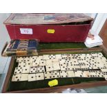 BONE AND EBONY DOMINOS IN A WOODEN CASE, PLAYING CARDS AND OTHER ITEMS.