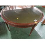 CIRCULAR MAHOGANY VENEERED OCCASIONAL TABLE WITH IN SET GLASS TOP. *