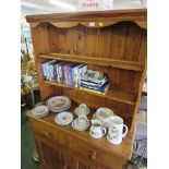 PINE DRESSER WITH TWO SHELVES TO TOP AND TWO DRAWERS OVER TWO CUPBOARD DOORS TO BASE.