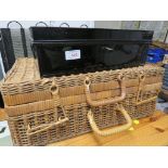 A BLACK PAINTED STEEL LOCK BOX , TOGETHER WITH A RATTAN PICNIC BASKET. *