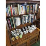 SMALL MID OAK DRESSER WITH TWO SHELVES TO ITS TOP AND TWO DRAWERS TO BASE. (AF)