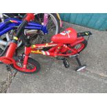 A FIRE CHIEF RESCUE CHILDREN'S BIKE WITH STABILISERS. (AF)