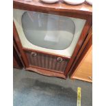 VINTAGE BUSH TELEVISION IN A WOOD VENEERED CABINET. (AF) *