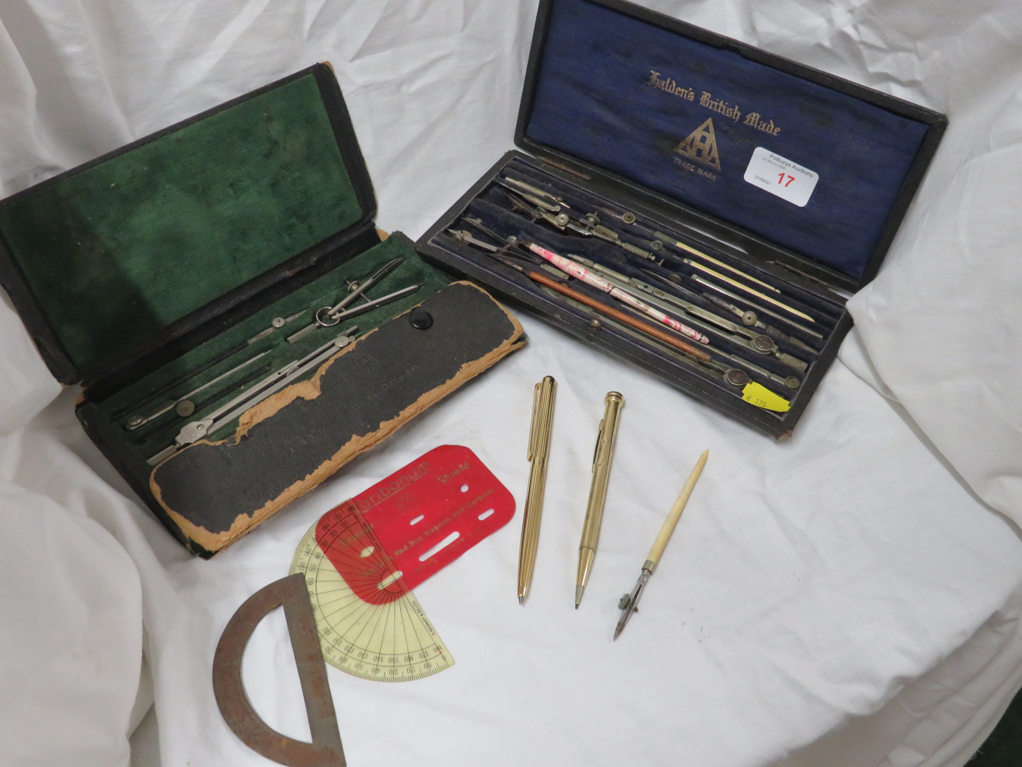 TWO CASED SETS OF DRAWING INSTRUMENTS. (AF) GOLD PLATED PROPELLING PENCIL AND OTHER SMALL ITEMS.