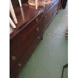 STAG MINSTREL MAHOGANY VENNERED EIGHT DRAWER CHEST TOGETHER WITH A MATCHING THREE DRAWER CHEST.