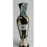 Moorcroft vase decorated with a penguin & chick: dated 2008, height 21cm.