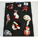 A set of nine modern brooches: (9)