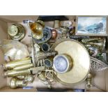 A large heavy box of brass ornaments: novelties and candlesticks