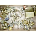 A large heavy box of brass ornaments: novelties and candlesticks