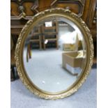 Gilt Effect Oval Wall Mirror: length at widest point 69cm