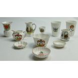 A collection of Shelley Crested ware to include: Horn, thistle vase, cream & sugar bowl, egg cup,