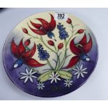Moorcroft 2001 year plate decorated with flowers: diameter 22.5cm.