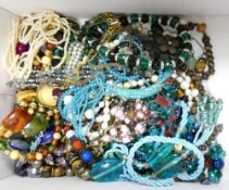 Collection of costume jewellery mainly beads in a shoe box: