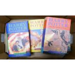 A collection of Harry Potter books: including three paperback and four hardback editions.