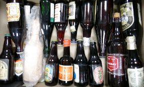 A collection of vintage beer bottles: All unopened including commemorative bottles of 182 Christmas