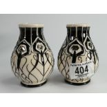 Moorcroft pair of small vases decorated with Art Deco black/silver design, height 10.5cm.