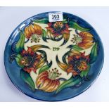 Moorcroft 1999 year plate decorated in the Anna Lily design: diameter 22cm.