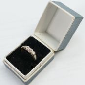 18ct three stone Diamond ring: Size J, 2.6g.