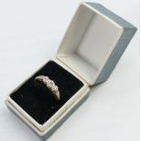 18ct three stone Diamond ring: Size J, 2.6g.