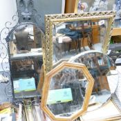 Four wall mirrors: to include Wrought iron framed item,