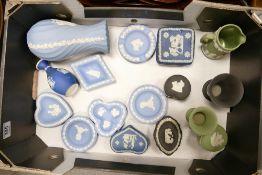 A collection of Wedgwood multi coloured jasper ware items to include: blue pin dishes and ashtrays,
