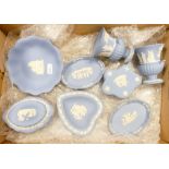 A group of 8 pieces of Wedgwood blue jasper ware: Includes vases,