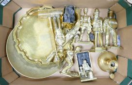 A large heavy box of brass items to include: police and miners figures, candlesticks,