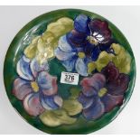 Walter Moorcroft large footed bowl decorated in the clematis design: paper label to base,