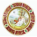 Vienna gilded cabinet plate decorated with a romantic landscape:, diameter 31cm.