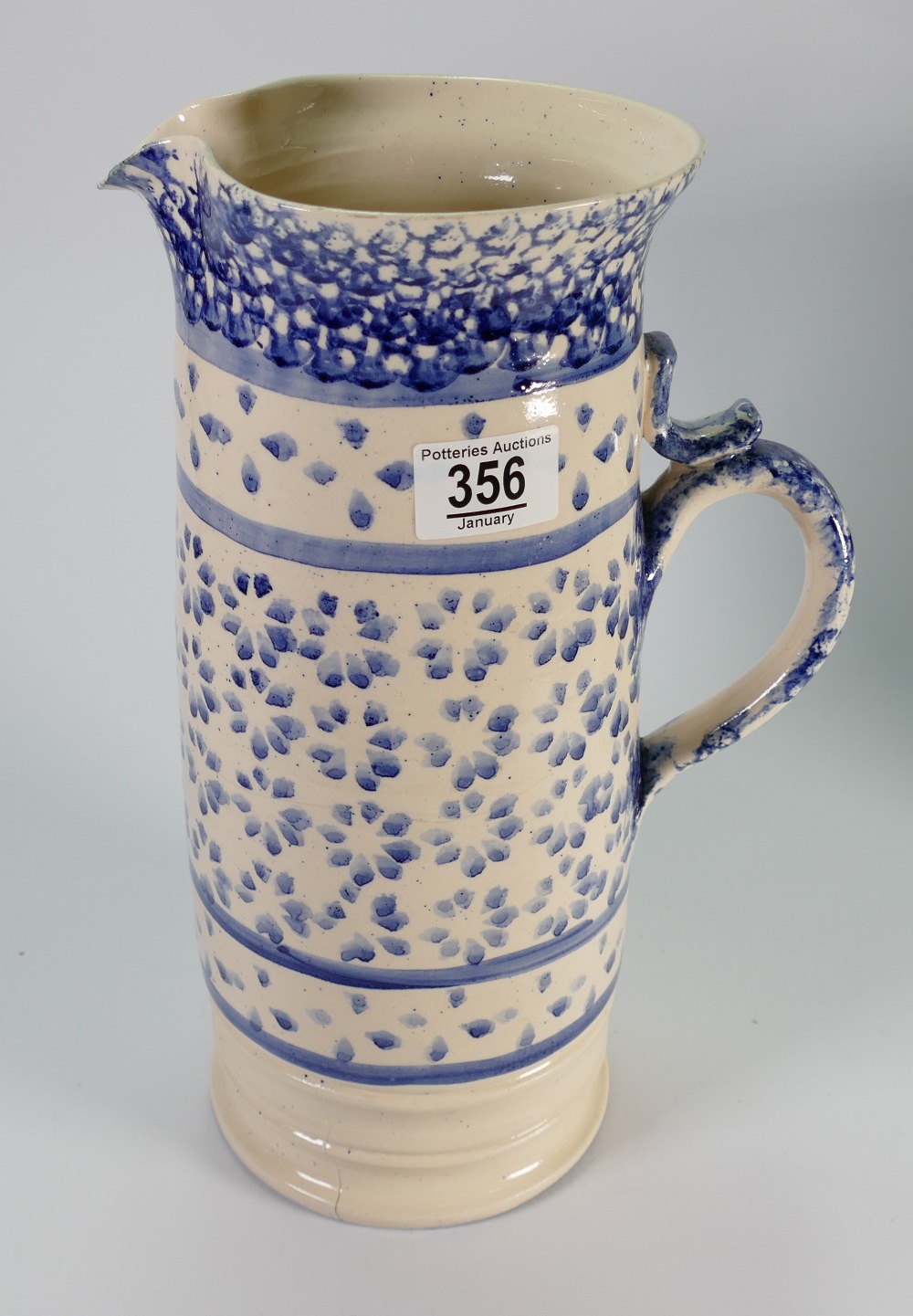 Staffordshire hand thrown sponge ware large ewer: height 33cm.