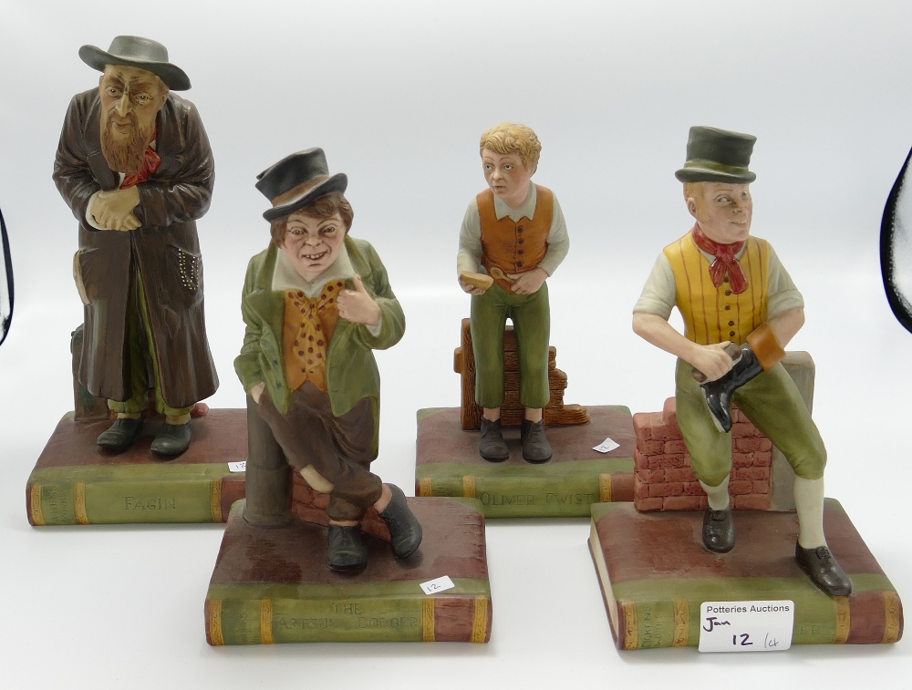 A collection of Aynsley China Dickens character figures: comprising Sam Weller,Oliver Twist,