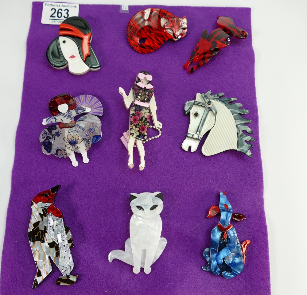 A set of nine modern brooches: (9)