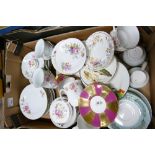 A mixed collection of floral decorated tea ware: