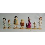 A collection of Beswick Flintstones figures: Fred and Wilma, Pebbles Flintstone, Barney and Betty,