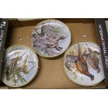 A collection of Franklin porcelain game birds of the world plates: