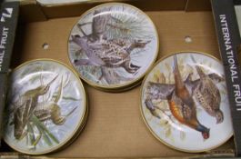 A collection of Franklin porcelain game birds of the world plates: