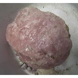 A large natural piece of unfinished pink quartz: weighing over 8.8 kg.