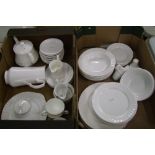 A large collection of plain white fluted dinner and tea ware: (2 trays).