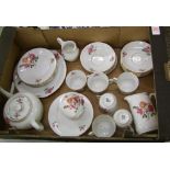 Victoria China (Czech) floral decorated tea ware items: teapot, cups, saucers, side plate, milk jug.