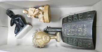 A collection of items to include: Chinese Bronze Bell, Stone Deity Figure, African Bronze mask