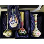 Three Old Tupton Ware boxed vases: together with a boxed ladle (4).