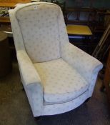 Early 20th Century ladies upholstered arm chair: standing on brass castors. Height 95cm x 73cm
