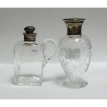 Two Silver Topped Glass Bottles: height of tallest 13cm(2)