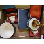 A small collection of Royal Worcester items: egg cup, vase, lidded pot and pin dish, all boxed.